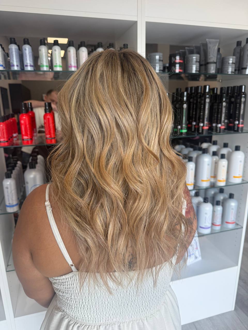Dimensional blonde highlights with soft waves